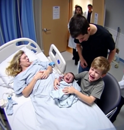 Placed gently in his brother’s arms, the stillborn baby suddenly let out a piercing cry
